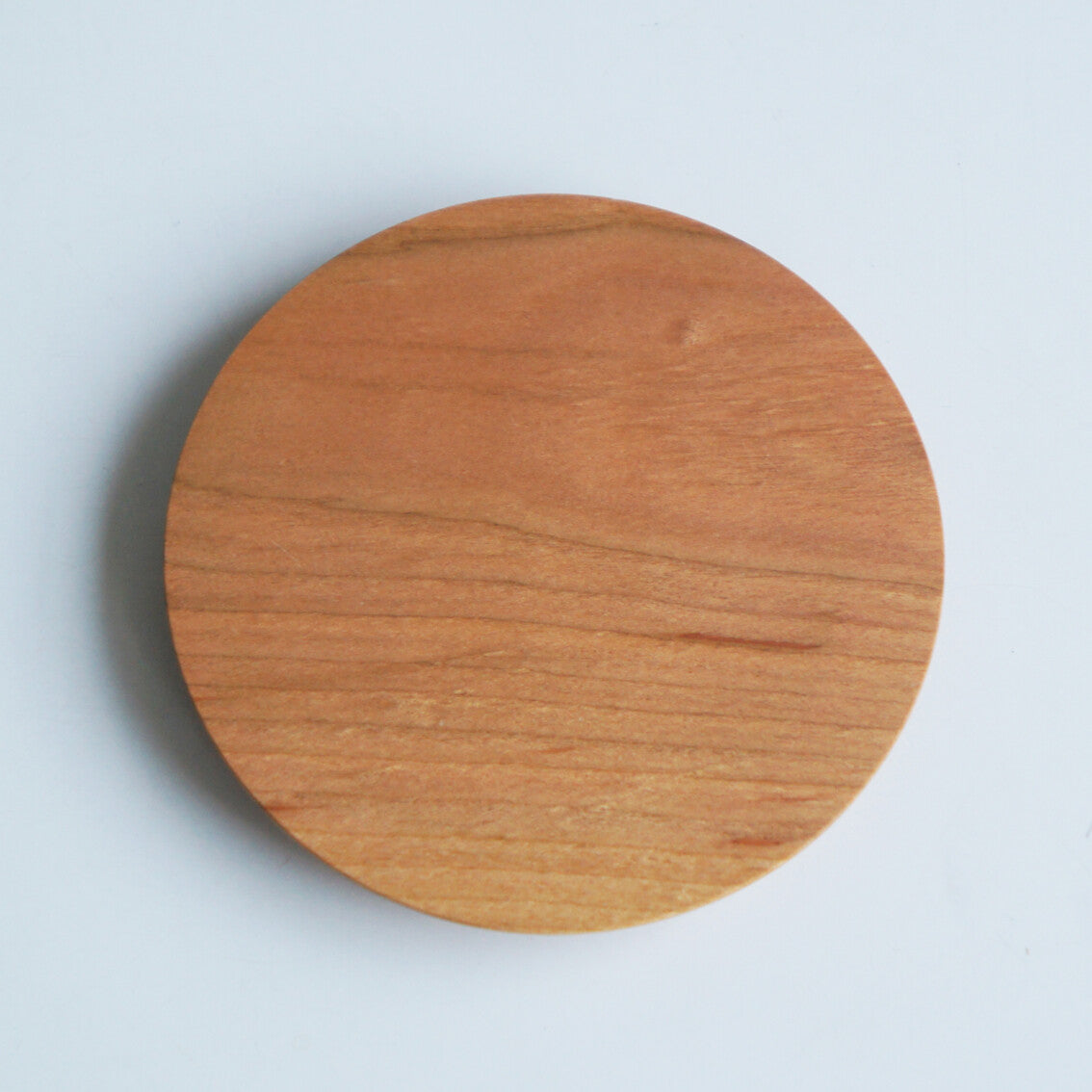 Mountain cherry wood coaster